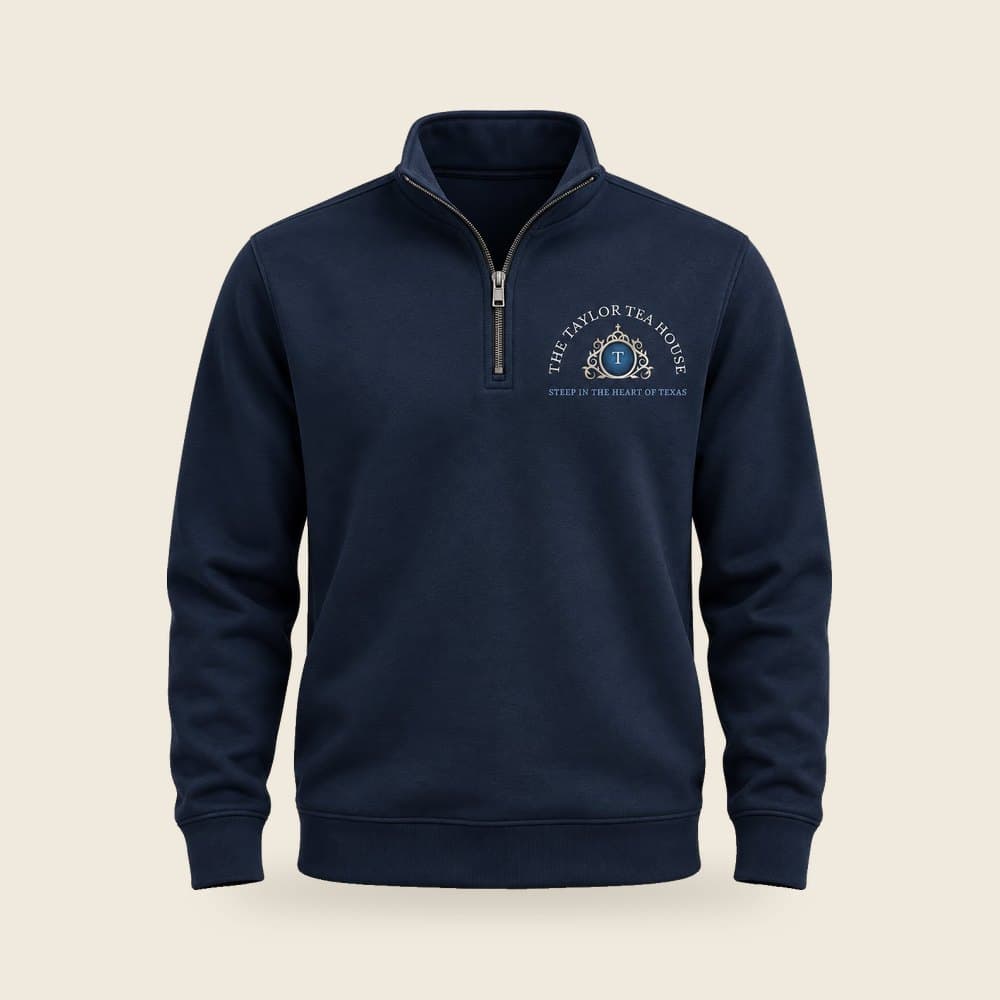 The Taylor Tea House Quarter Zip embroidered crest in navy, product mockup